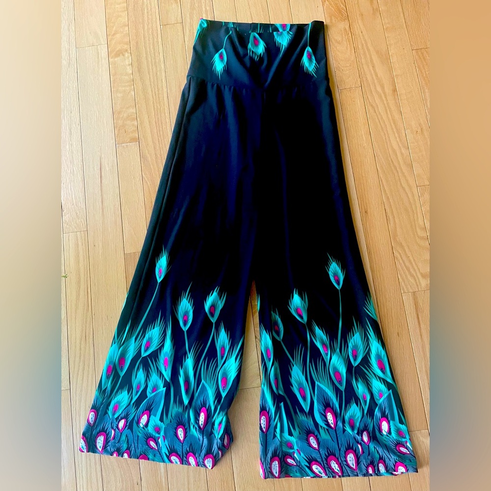High-waisted peacock palazzo pants.